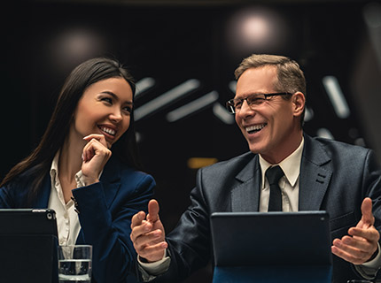 the-smiling-man-and-woman-sitting-at-the-table-on--Q8FVJ9V